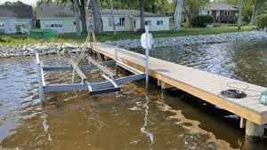 pile mounted Boat Lifts by Boondocks Piling & Piers in Wisconsin